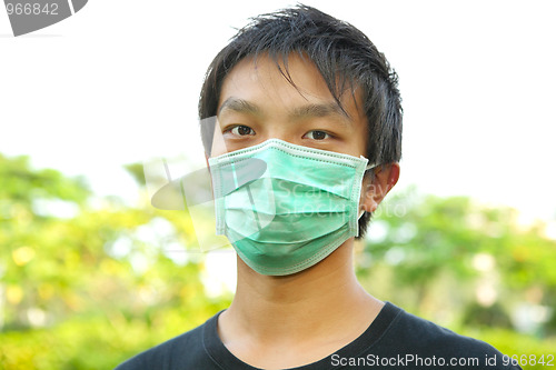 Image of man wear mask outdoor