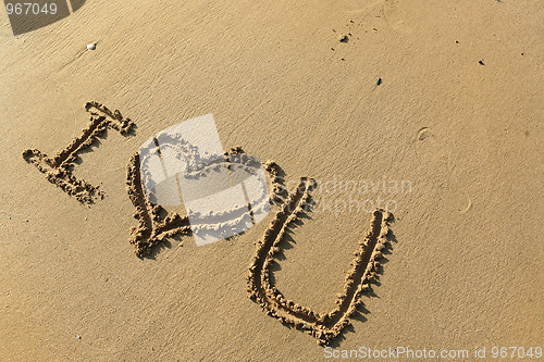 Image of "I love you" drawing on the beach