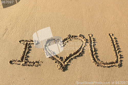 Image of "I love you" drawing on the beach