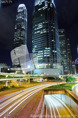 Image of traffic light stream in city at night