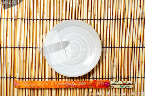Image of plate and chopsticks