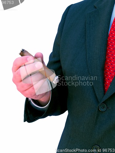 Image of businessman smoking a cigar