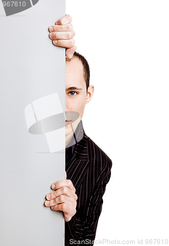 Image of Businessman showing something