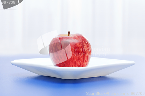 Image of Apple in white plate