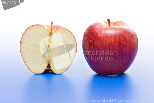 Image of Half and whole apple