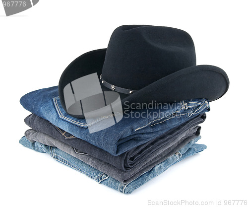Image of Cowboy hat and jeans for a man