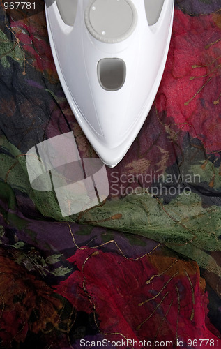 Image of Ironing colorful delicate silk