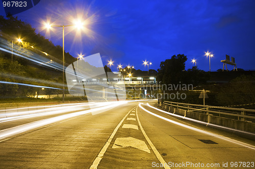 Image of Modern Urban City with Freeway Traffic at Night,