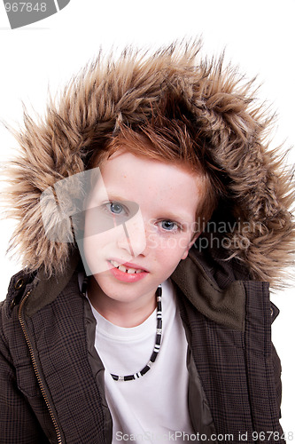 Image of Cute boy with a furry hood