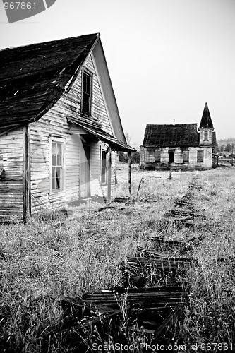 Image of abandoned house and church