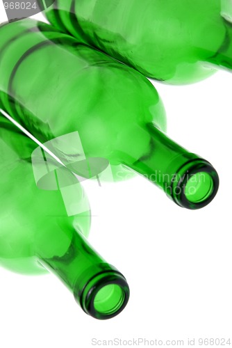 Image of Detail of empty green glass wine bottles