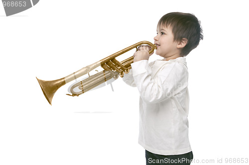 Image of Boy playing on a trumpet