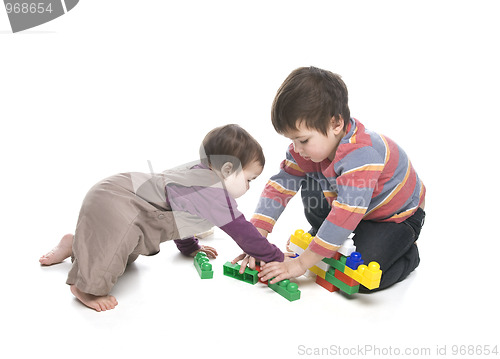 Image of Brother and sister playing together