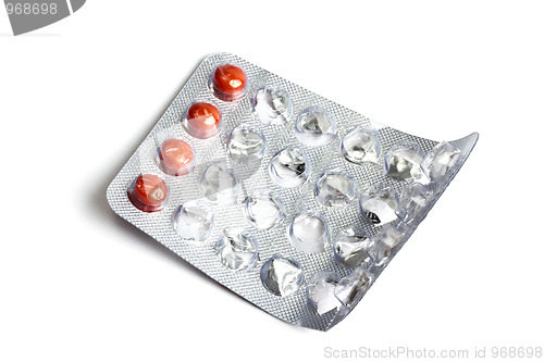 Image of Red pills isolated on white