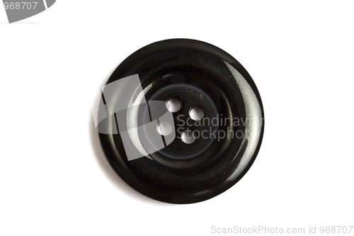 Image of  Black clothing button isolated on white 