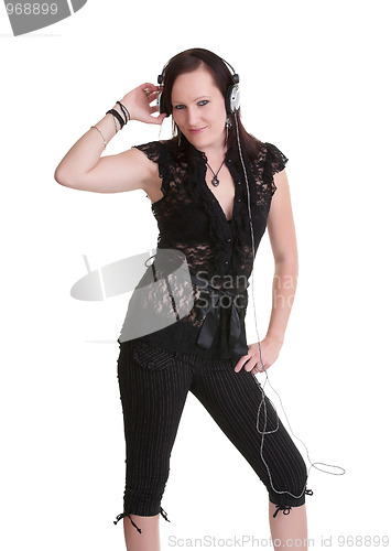 Image of young woman listening headphones