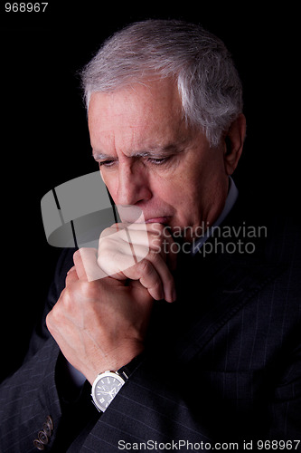 Image of Portrait of a handsome mature businessman, thinking