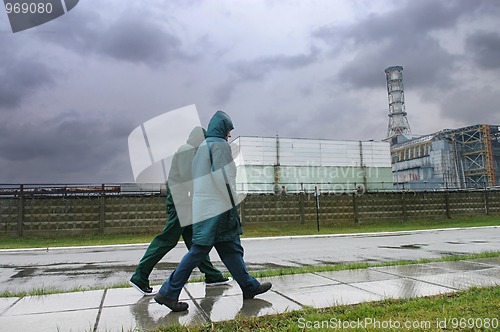 Image of people walking near the Chornobyl Nuclear Power Plant