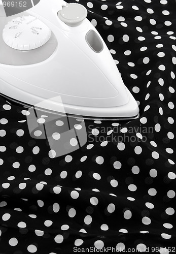 Image of Ironing delicate silky fabric