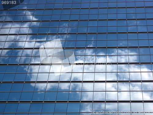 Image of Glass wall with the reflection of sky