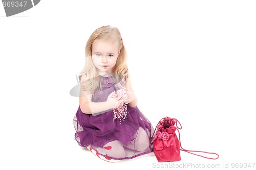 Image of Studio shot of baby girl in gala dress