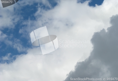 Image of diagonal dark and white clouds