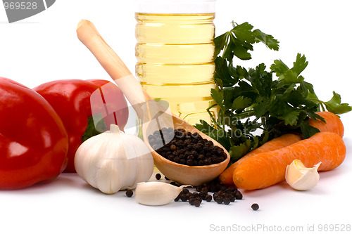 Image of vegetables, pepper and oil closeup