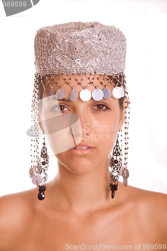 Image of Beautiful young model in hat on the white background.