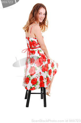 Image of Pretty girl in colorful dress.