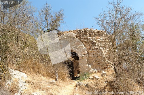 Image of Ruin of the old stone house in Mediterranean landscape