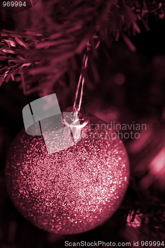 Image of Christmas ornaments on tree.