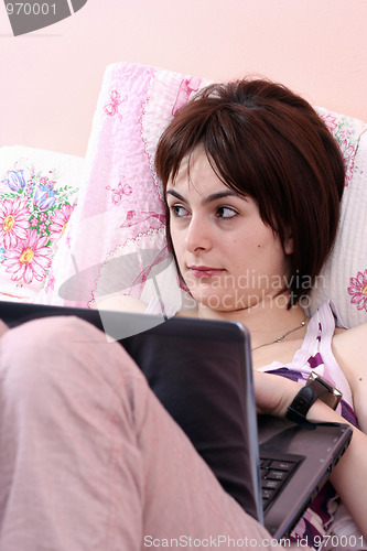 Image of Young woman with laptop 