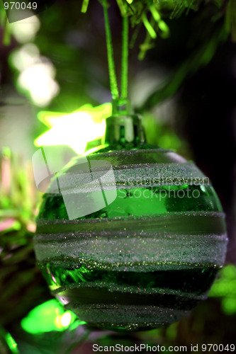 Image of Christmas ornaments on tree.