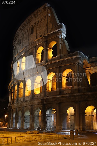 Image of Colosseum at night in Rome, Italy  