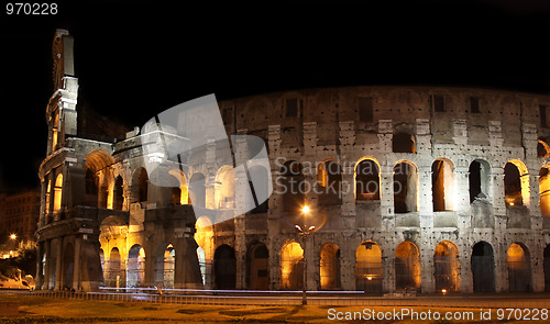 Image of Colosseum at night in Rome, Italy  