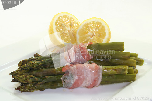 Image of green asparagus in bacon coat