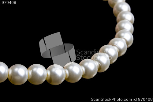 Image of Beautiful string of beads isolated on black 