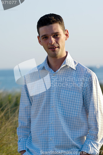 Image of Young man smiling