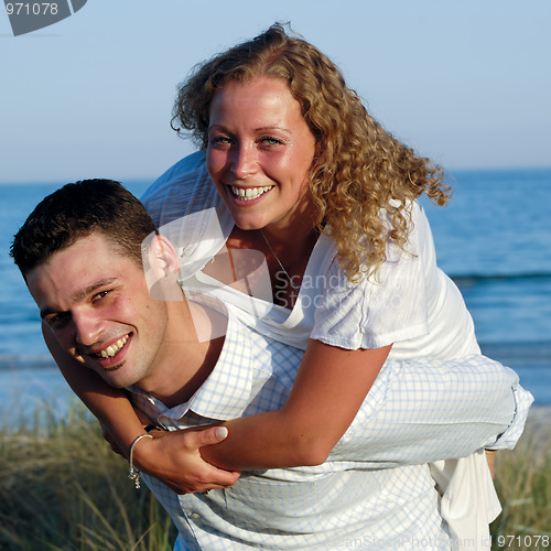 Image of Young couple having fun