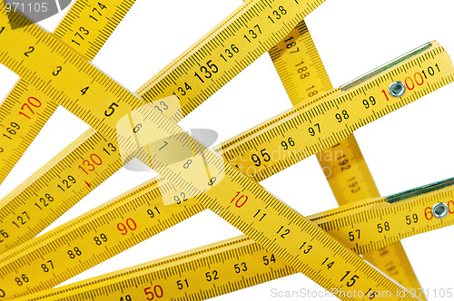 Image of Yellow collapsible ruler of the carpenter