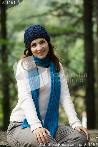 Image of Happy young woman in nature