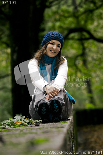 Image of Happy young woman in nature