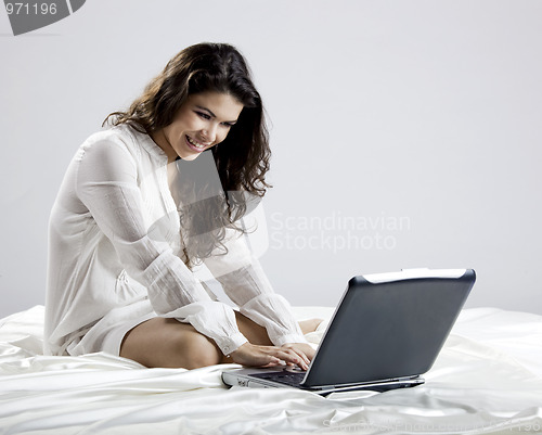 Image of Working on the bed