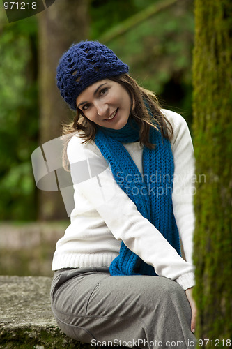 Image of Happy young woman in nature