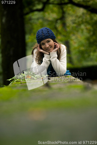 Image of Beautiful young woman in nature