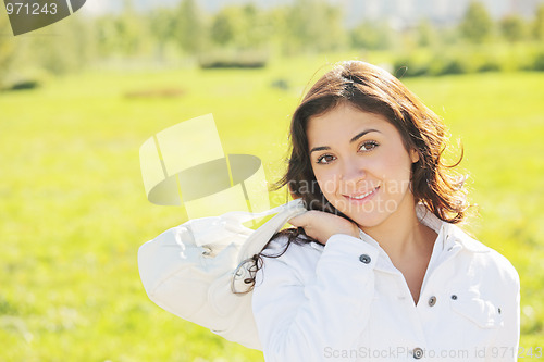 Image of Young cute woman with white bag