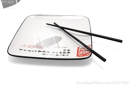 Image of Empty plate and chopsticks