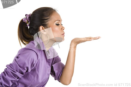 Image of woman blowing a kiss