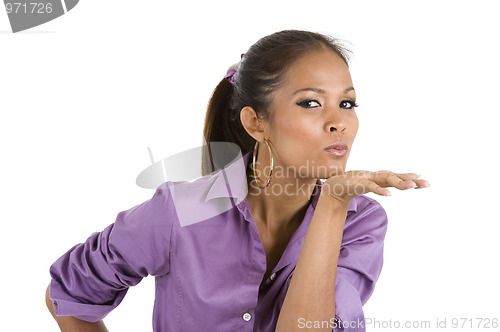 Image of woman blowing a kiss