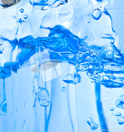 Image of Sparks of blue water on a white background